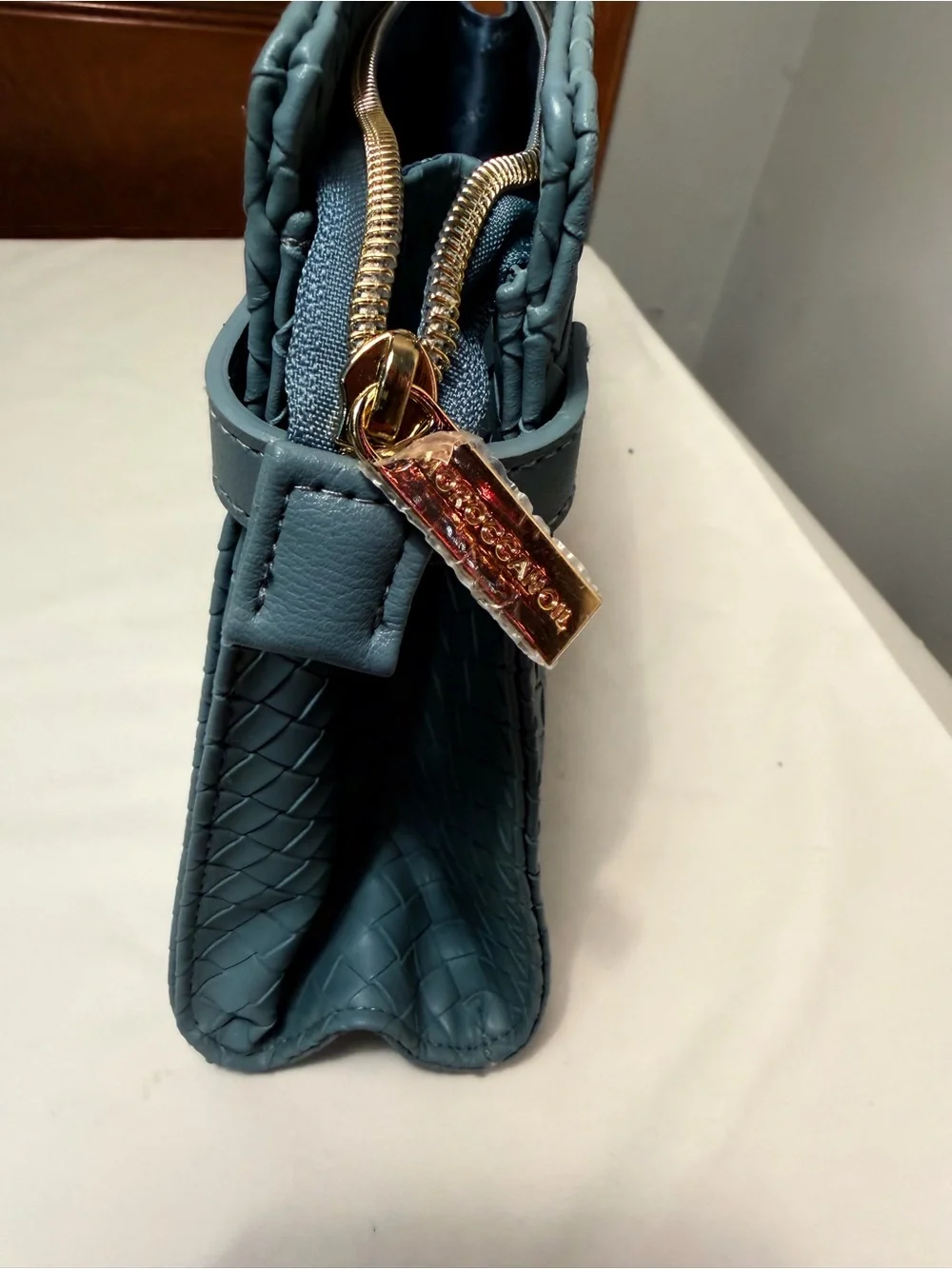 Moroccanoil Teal Woven Cosmetic Pouch with Gold Accents